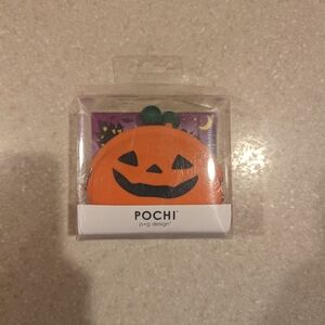 New in box Pochi P+g design pumpkin jack o lantern small silicone coin pouch bag